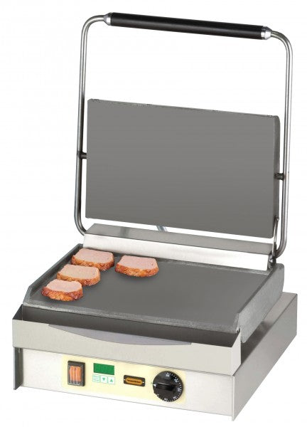 Grillplatte mit Fleischscheiben.