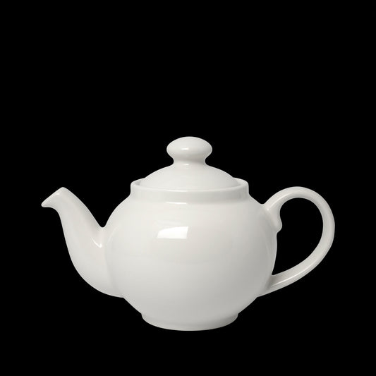 Weiße Teekanne auf schwarzem Hintergrund.