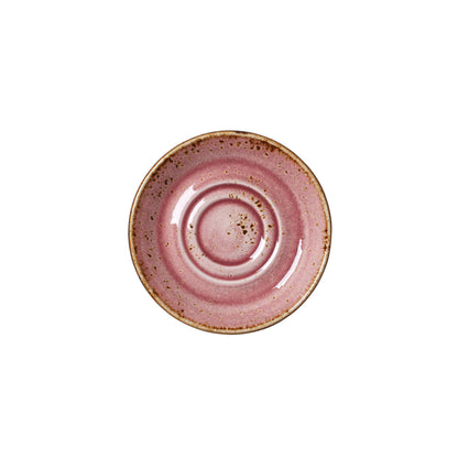 Rosa Keramikteller mit Sprenkeln.