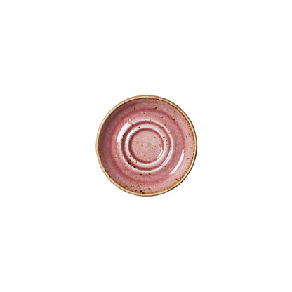 Rosa Untertasse mit Sprenkeln.