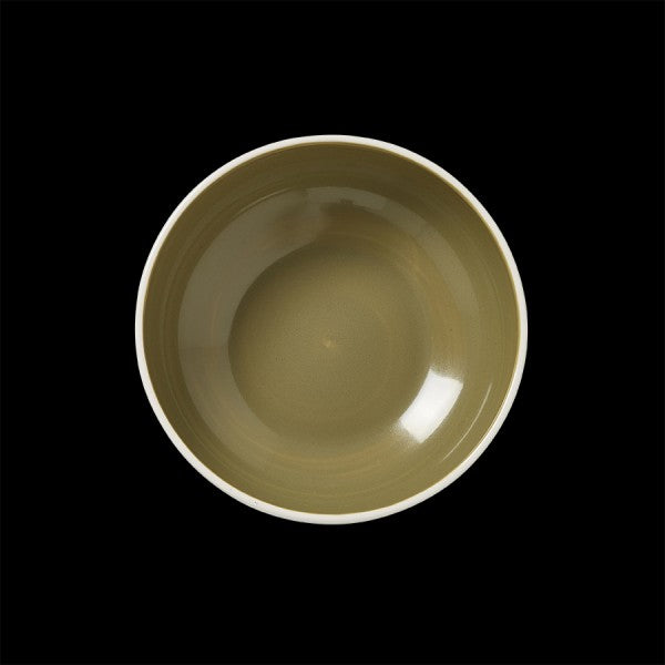 Leere grüne Schüssel auf Schwarz.