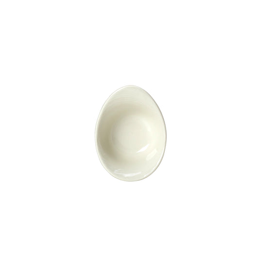 Weiße, ovale Schale von oben.