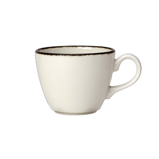 Weiße Tasse mit schwarzem Rand.