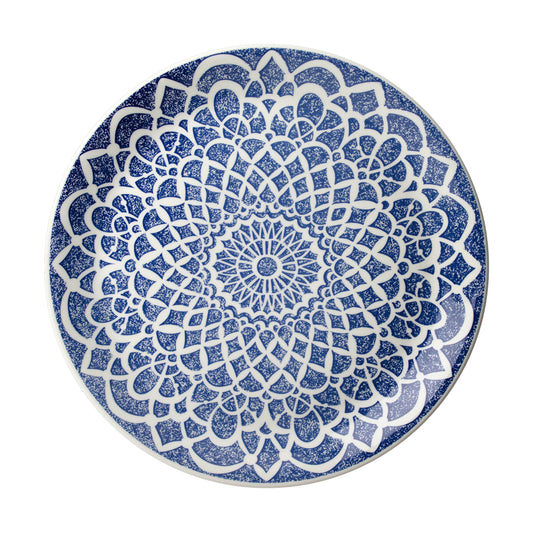 Blauer Teller mit Mandala-Muster.