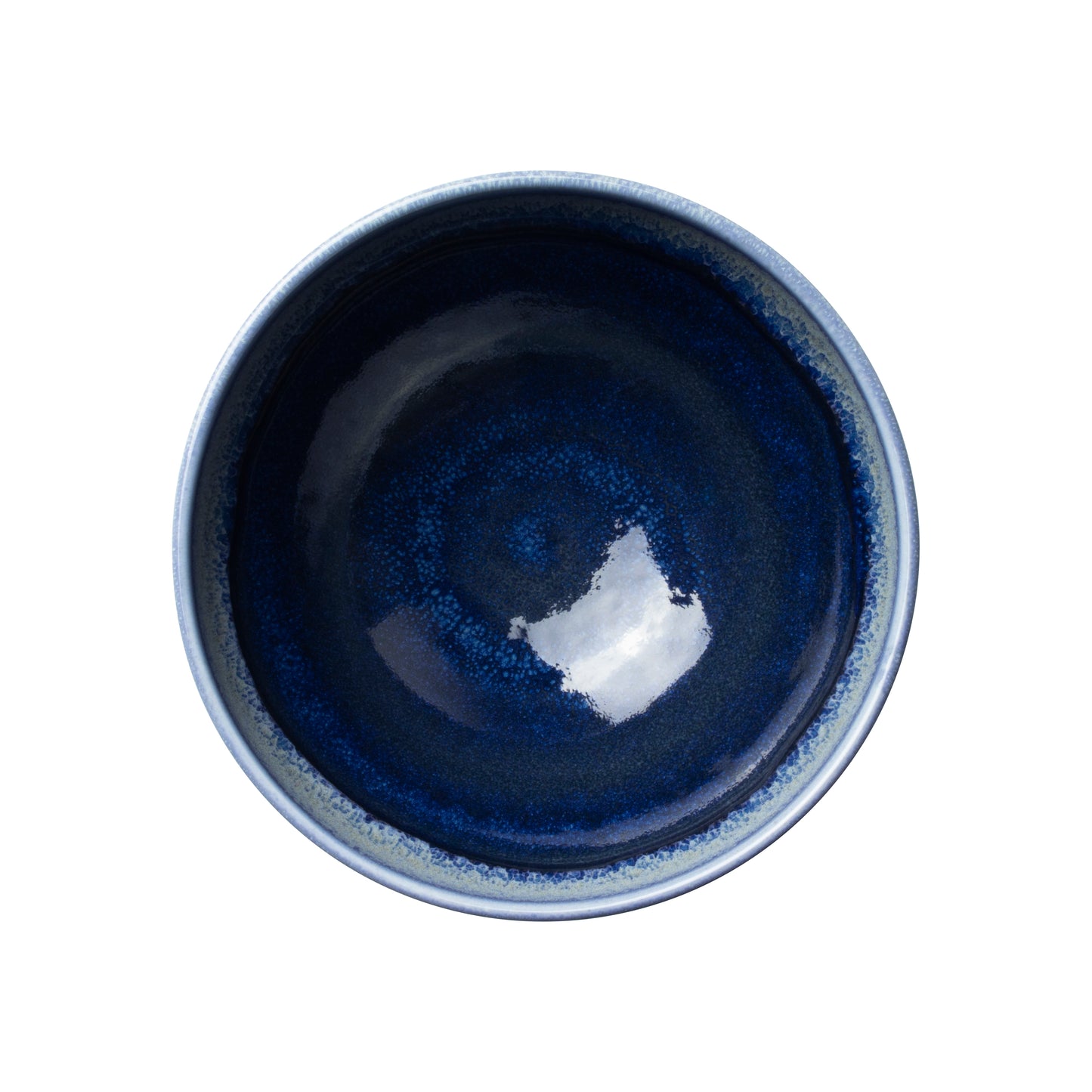 Blauer Keramikteller von oben.