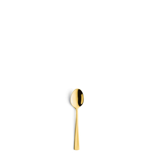 Goldene Löffel auf weißem Hintergrund