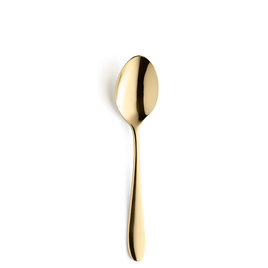 Goldene Löffel auf weißem Hintergrund