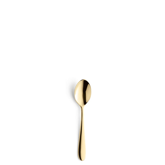 Goldene Löffel auf weißem Hintergrund