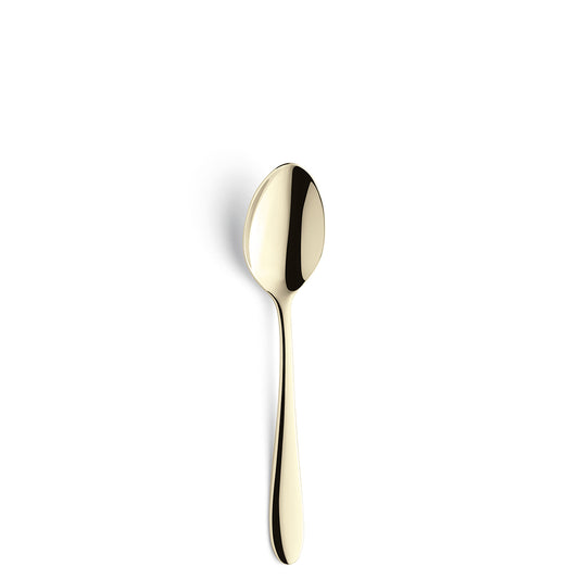 Goldene Löffel auf weißem Hintergrund
