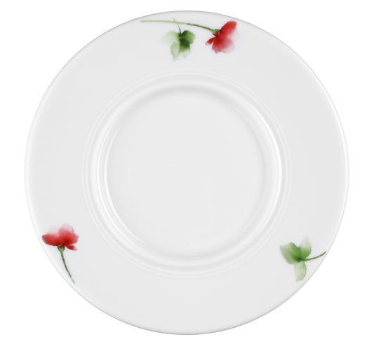 Weißer Teller mit Blumenmuster.