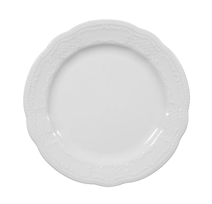 Weiße Speiseteller mit Ornamenten