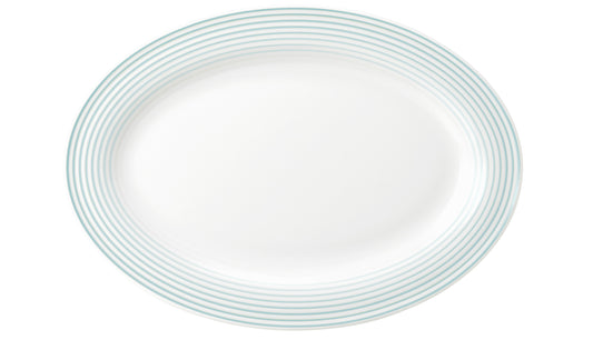 Weiße Platte mit blauen Ringen