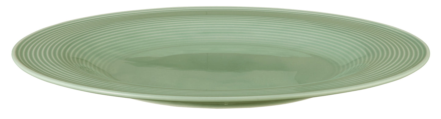 Grüner Teller mit Rillenmuster