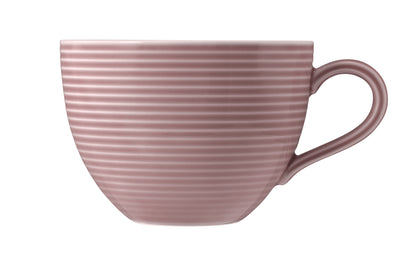 Rosa Kaffeetasse mit Rillenstruktur