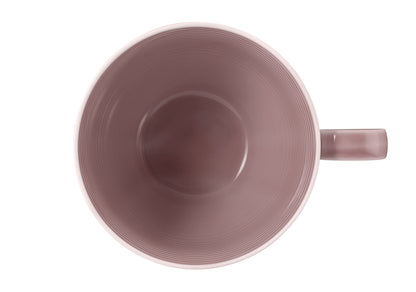 Rosa Kaffeetasse mit Rillenstruktur