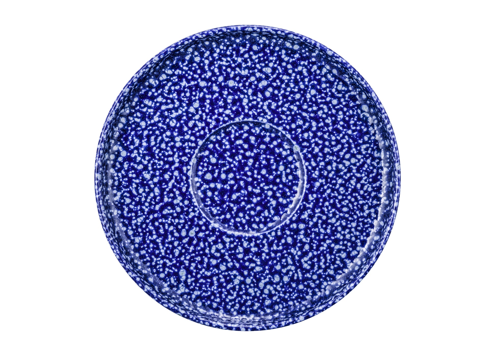 Blauer Teller mit Sprenkeln