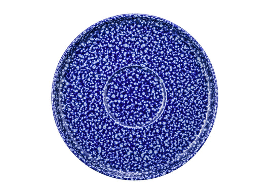 Blauer Teller mit Sprenkeln