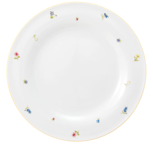 Leerer Teller mit Blumenmuster.