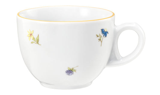 Weiße Tasse mit Blumenmuster.