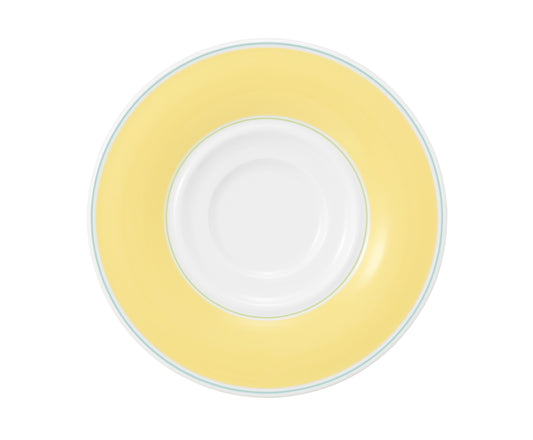 Gelbe und weiße Porzellantasse-Untertasse