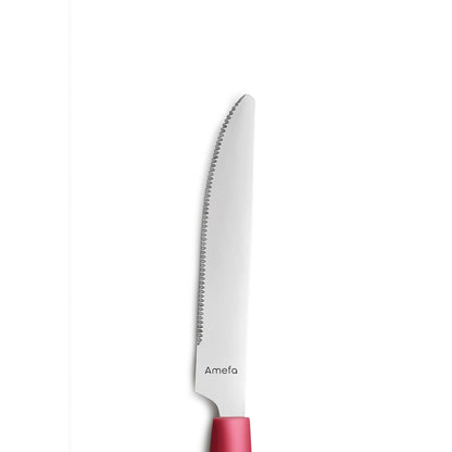 Rotes Tafelmesser mit Wellenschliff.