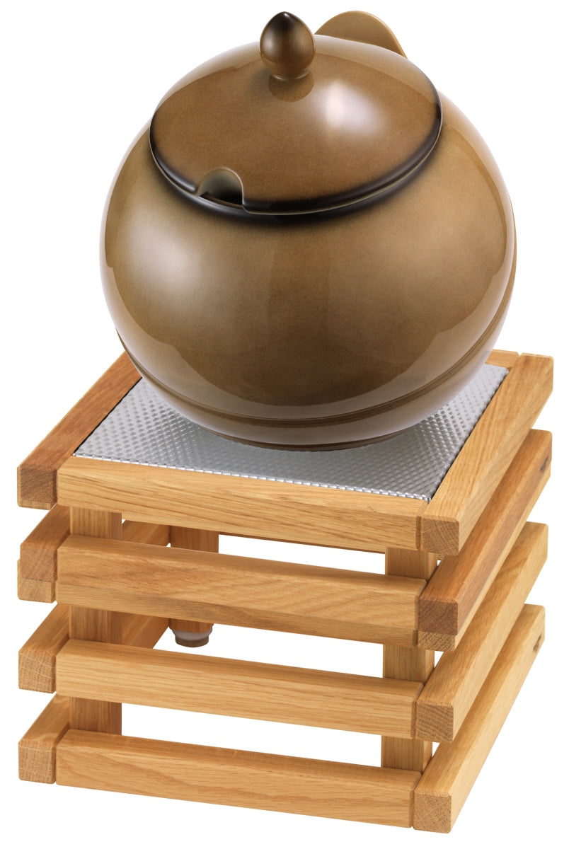 Kaffeekanne auf Holzständer