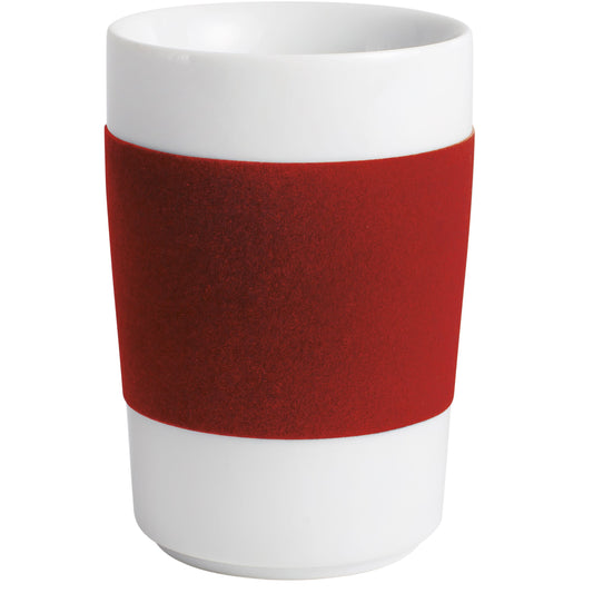 Weiße Tasse mit rotem Band.