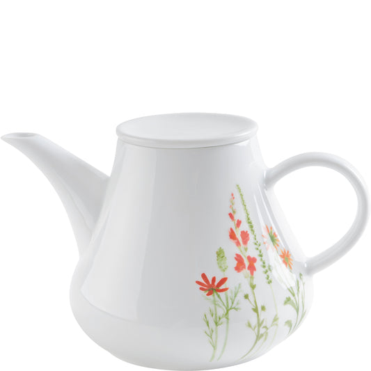 Weiße Teekanne mit Blumenmuster.