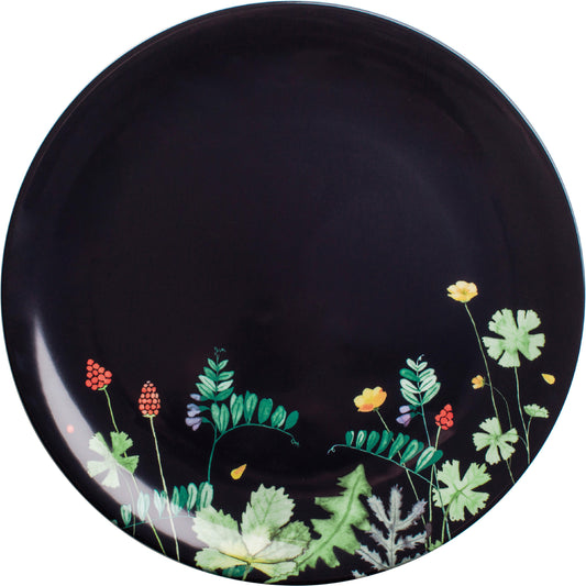 Dunkler Teller mit Blumenmuster.