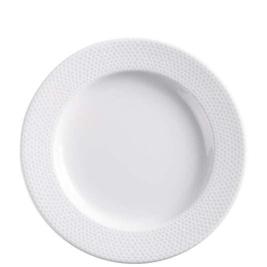 Weißer Porzellanteller mit Muster.