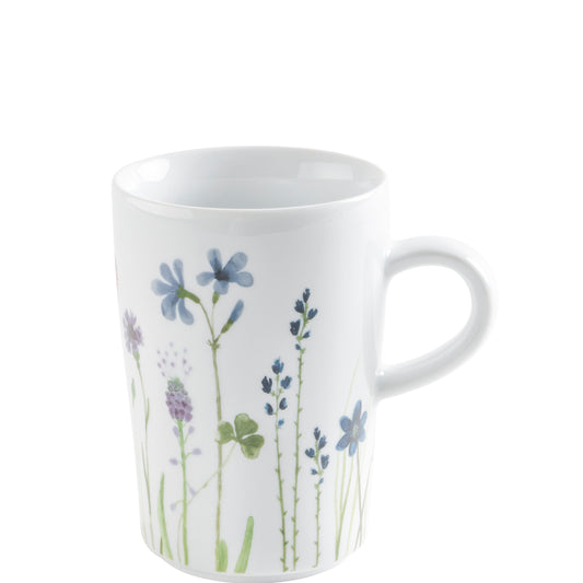 Weiße Tasse mit Blumenmuster.