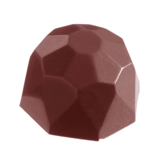 Dunkle, geometrische Schokoladenform.