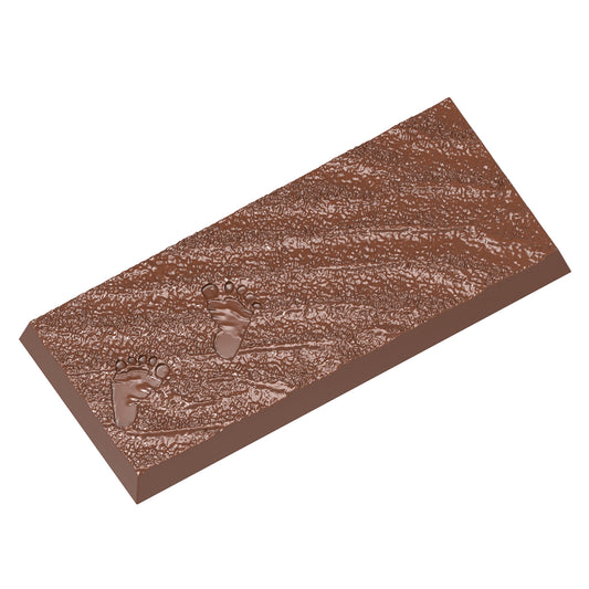 Schokoladentafel mit Fußabdrücken.