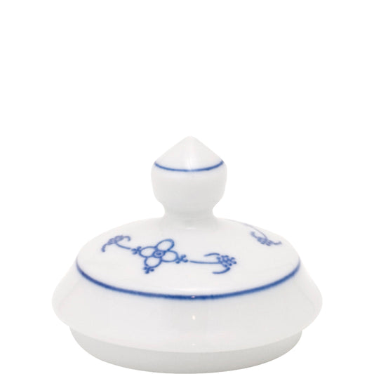 Porzellandeckel mit blauem Muster.