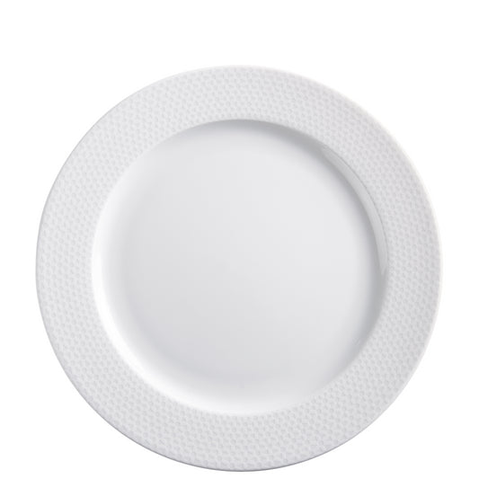 Weißer Porzellanteller mit Muster.