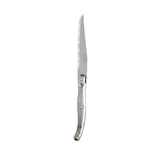 Silbernes Steakmesser mit Holzgriff.