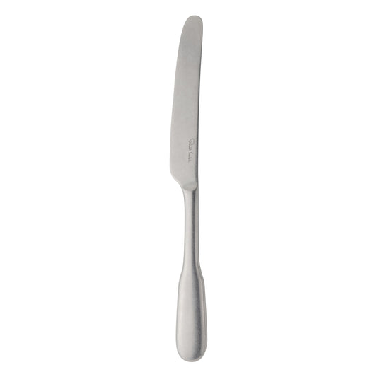 Silbernes Buttermesser auf weißem Hintergrund.