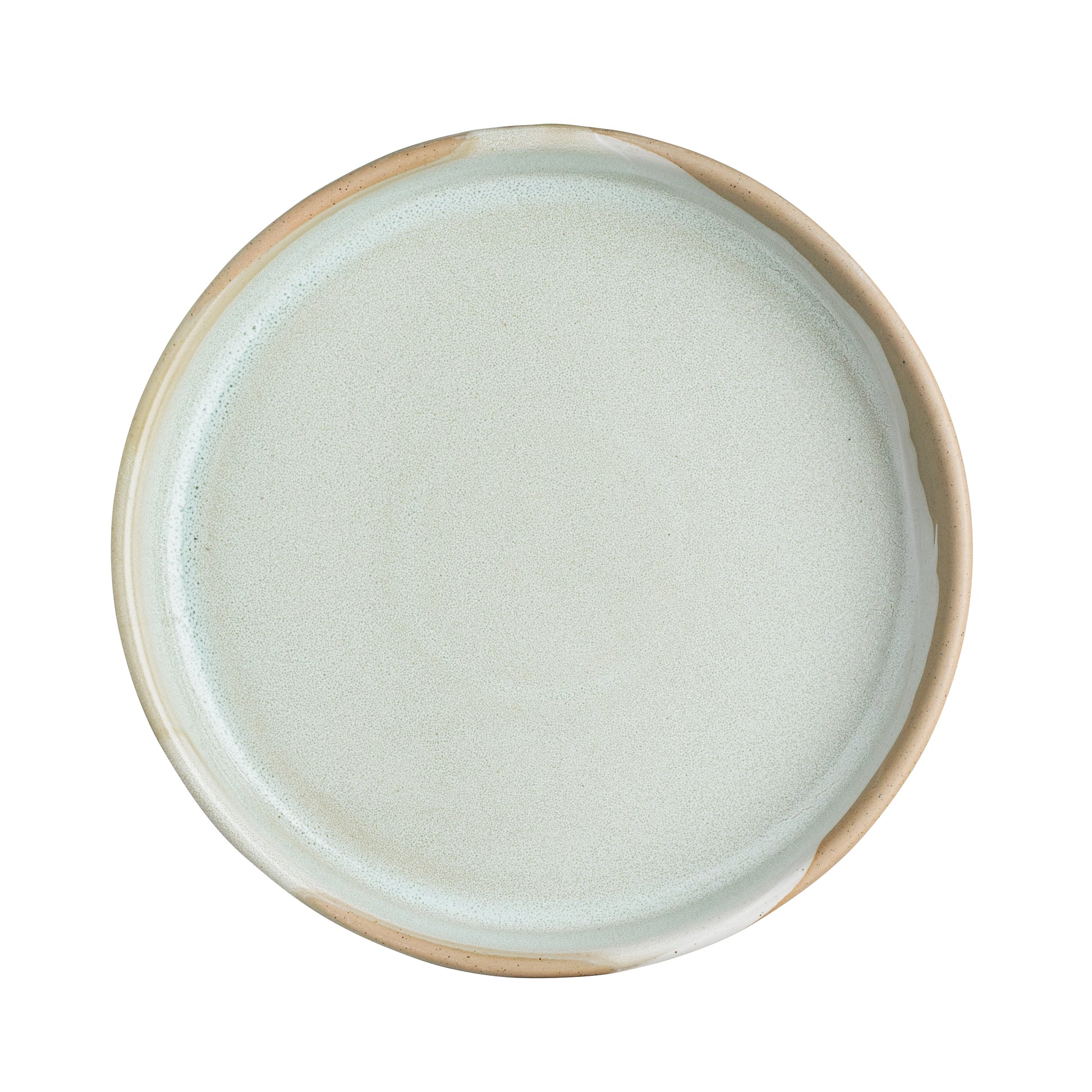 Leerer, runder, weißer Keramikteller.