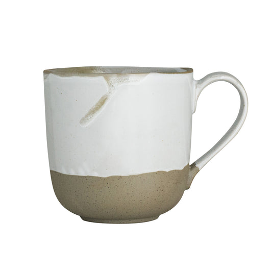 Keramiktasse mit zweifarbiger Glasur.