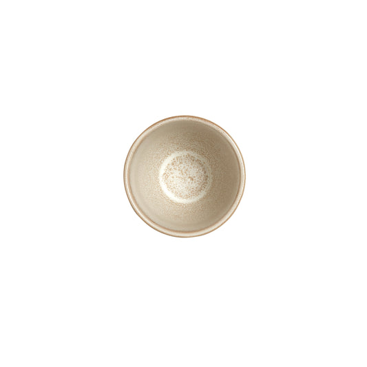 Leere, beige Schüssel von oben.