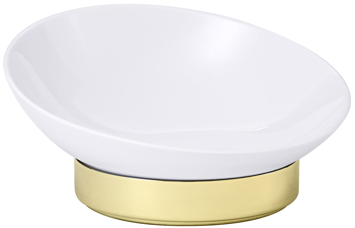 Weiße Schale auf goldfarbenem Sockel