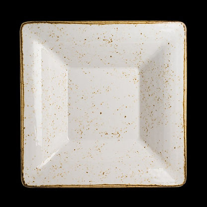 Quadratischer, gesprenkelter, weißer Teller.