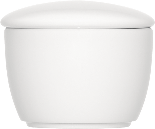 Weiße Porzellanschale mit Deckel.