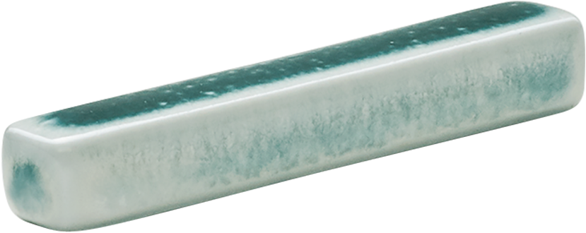 Keramikstäbchen mit grünem Muster.