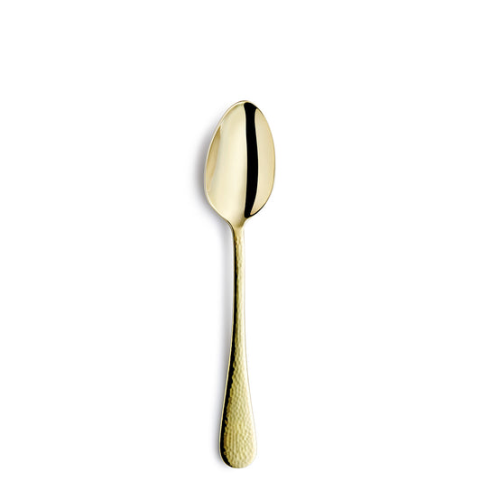Goldene Löffel auf weißem Hintergrund