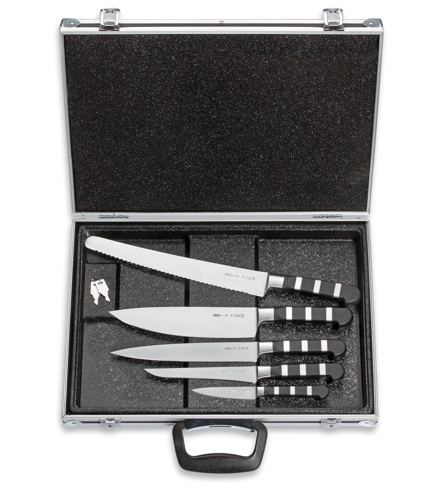 Messerset in einem offenen Koffer.