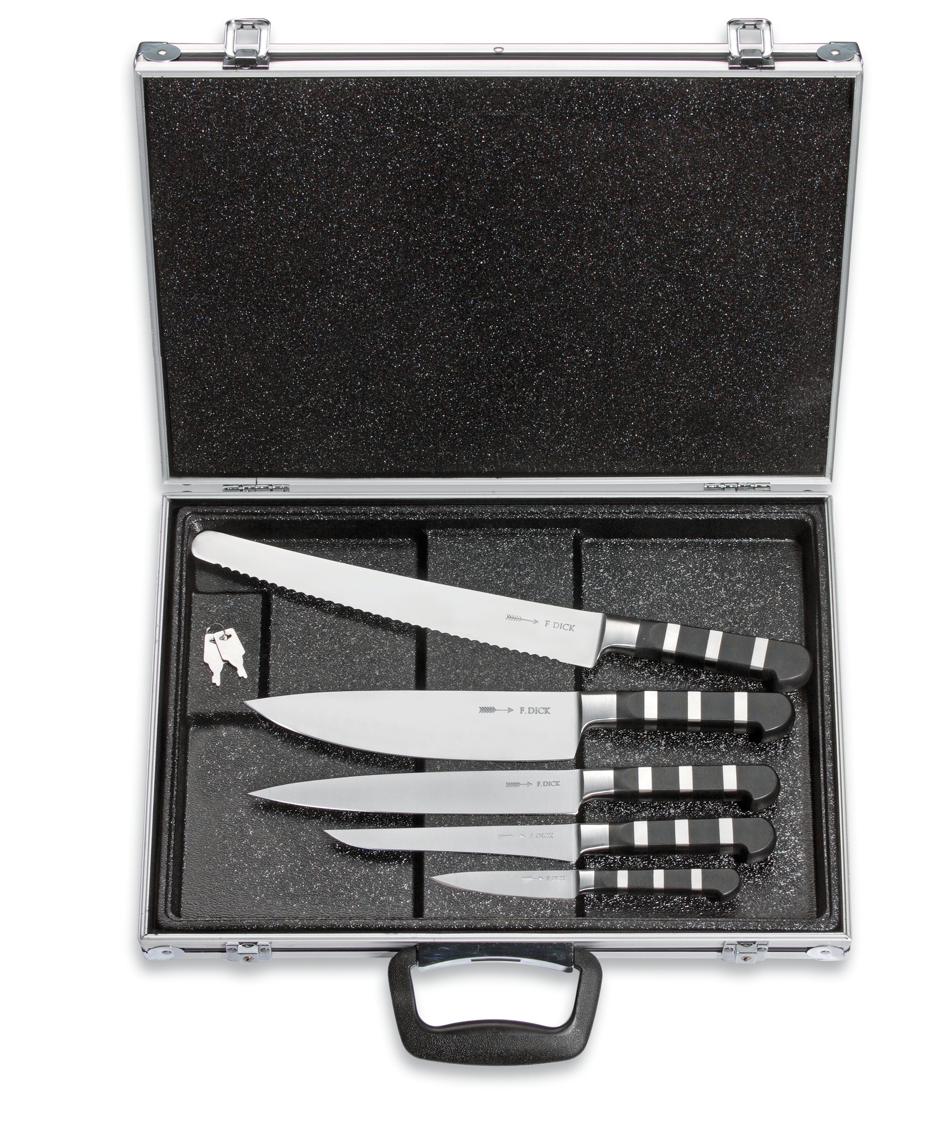 Messerset in einem offenen Koffer.