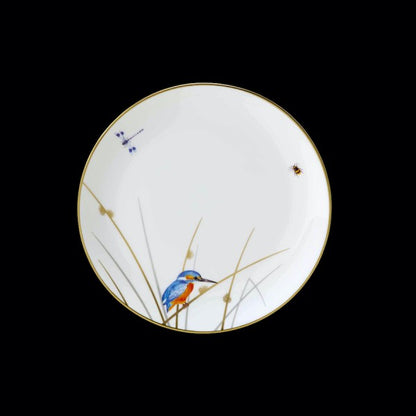 Teller mit Vogel- und Insektenmotiv.