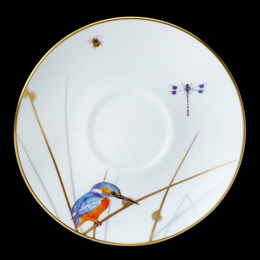 Teller mit Vogel- und Insektenmotiv.