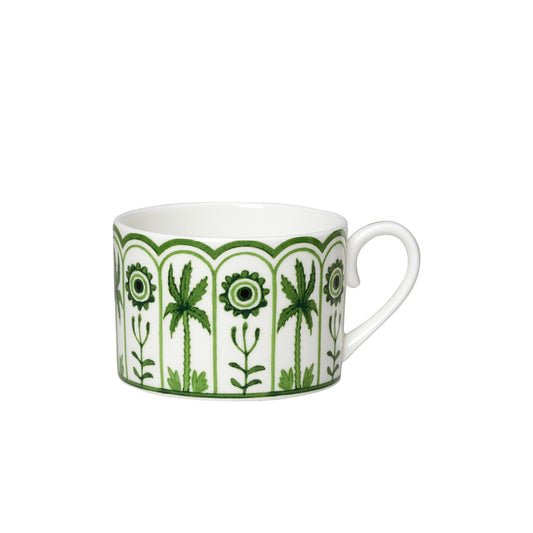 Tasse mit grünem Pflanzenmuster.
